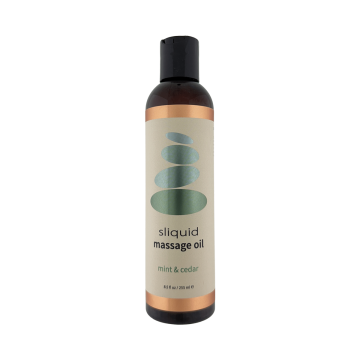 Exotic massage oil for couples with an earthy mint and cedar fragrance.
